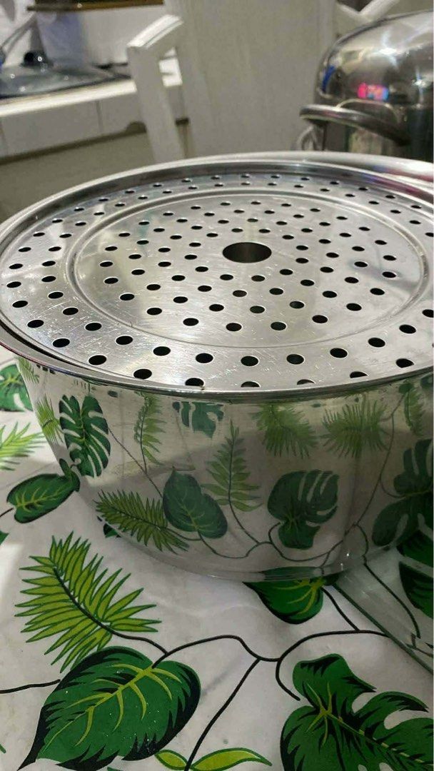 RENAWARE COOKWARE (Category: Cookers) located in Bay. Submitted by bunini7 (Listing ID 1468962131, Image 3). Description: RENAWARE VINTAGE set of vintage stainless steel waterless cookware. Material: Multi-ply or surgical-grade stainless steel. Design: Heavy-duty lids with characteristic black phenolic knobs and handles, designed for waterless or low-moisture cooking. Pieces included: The collection features various saucepans, a large roaster or 