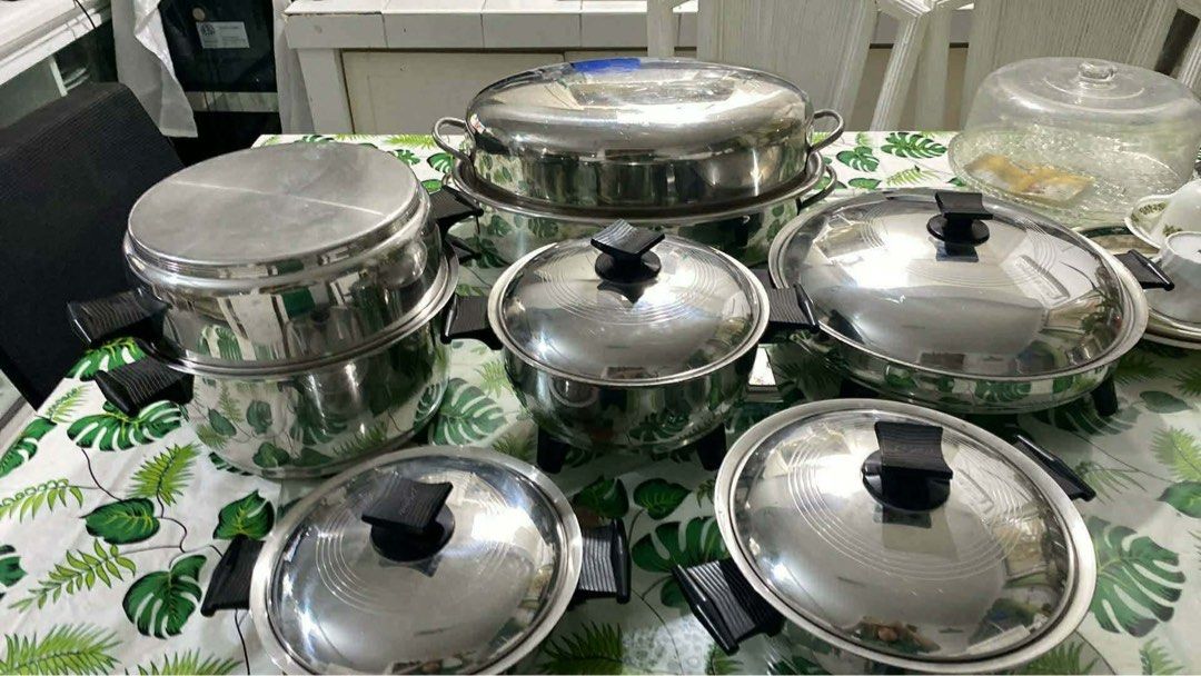 RENAWARE COOKWARE (Category: Cookers) located in Bay. Submitted by bunini7 (Listing ID 1468962131, Image 1). Description: RENAWARE VINTAGE set of vintage stainless steel waterless cookware. Material: Multi-ply or surgical-grade stainless steel. Design: Heavy-duty lids with characteristic black phenolic knobs and handles, designed for waterless or low-moisture cooking. Pieces included: The collection features various saucepans, a large roaster or 