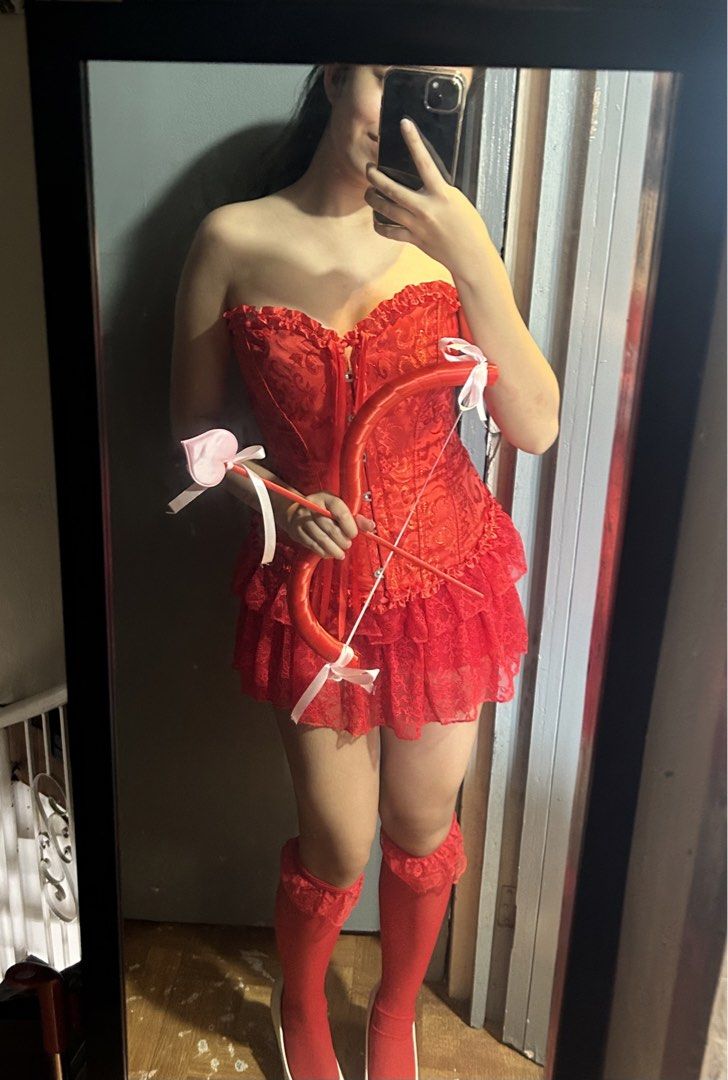 RENT: Red Cupid Halloween Costume Set (Category: Sets or Coordinates) located in Manila. Submitted by nicole.lcn (Listing ID 1469120188, Image 2). Description: Rent for only 500 a day. Loc: Las Piñas Size: Small - Medium Inclusions: - Red Corset - Red skirt - White wings - Red stocking - Cupid arrow Perfect for costume halloween 👀🏹.