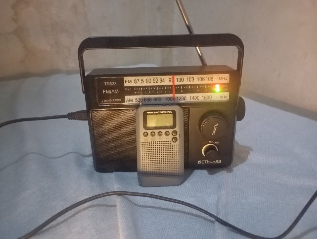 --RADIO BUNDLE-- Retekess TR633 & HRD-104 (Category: Portable Music Players) located in Cainta. Submitted by seth_jay1020 (Listing ID 1469094165, Image 1). Description: Selling two working portable radios as a bundle for ₱500. Great cheap setup for casual FM listening. 1. Retekess TR633 (Full-size Portable Radio) Condition: Working fine / Good condition. FM: Works great, clear and sounds good through the built-in speaker. Reception is good also. 