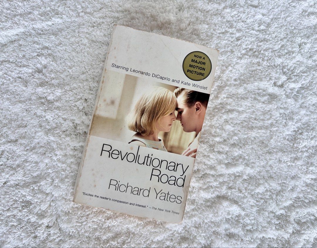 Revolutionary Road by Richard Yates (Paperback) (Category: Storybooks) located in Naga. Submitted by klutzdeclutters (Listing ID 1468935478, Image 1). Description: Condition: - Cover shows visible shelf wear, minor creasing, and softened edges - Spine is still sound and intact, though it has typical creasing. - Pages are complete and fully legible. May have slight natural tanning or minor dog-ears, but free from major stains or structural damage.