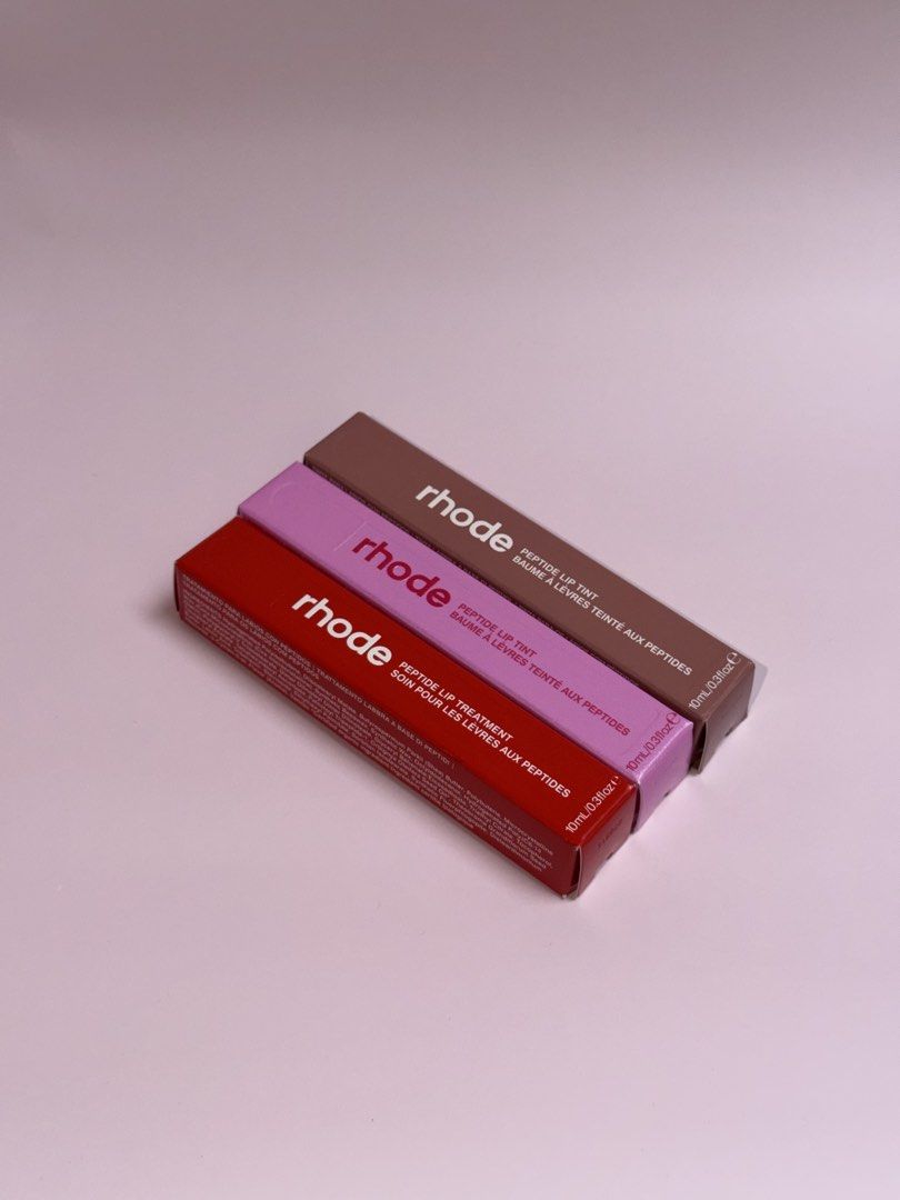 rhode Peptide Lip Tint / Lip Treatment (Category: Makeup) located in Naga. Submitted by millie_raine203 (Listing ID 1466815696, Image 1). Description: rhode Peptide Lip Tint - ₱1,700 - Toast - Jelly Bean rhode Peptide Lip Treatment- ₱1,700 - Strawberry Glaze.