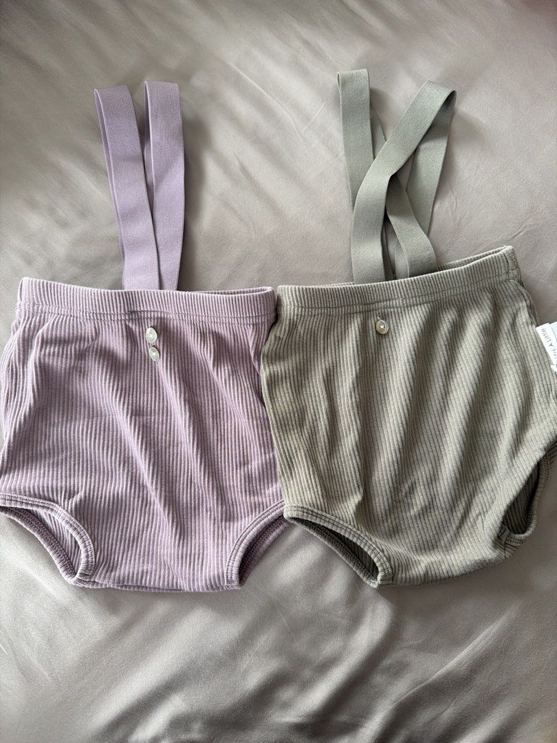 Ribbed baby suspender bloomers bundle size 74cm (Category: Babies & Kids Fashion) located in Manila. Submitted by 17thfinds (Listing ID 1468963367, Image 1). Description: - Bundle of 2 adorable ribbed baby bloomers with shoulder straps - Colors: Dusty Purple and Sage Green - Size: 74cm (Brand new with tags attached) - Material: Soft, stretchy ribbed knit for maximum comfort - Design: Cute decorative front buttons and classic crossed back straps -
