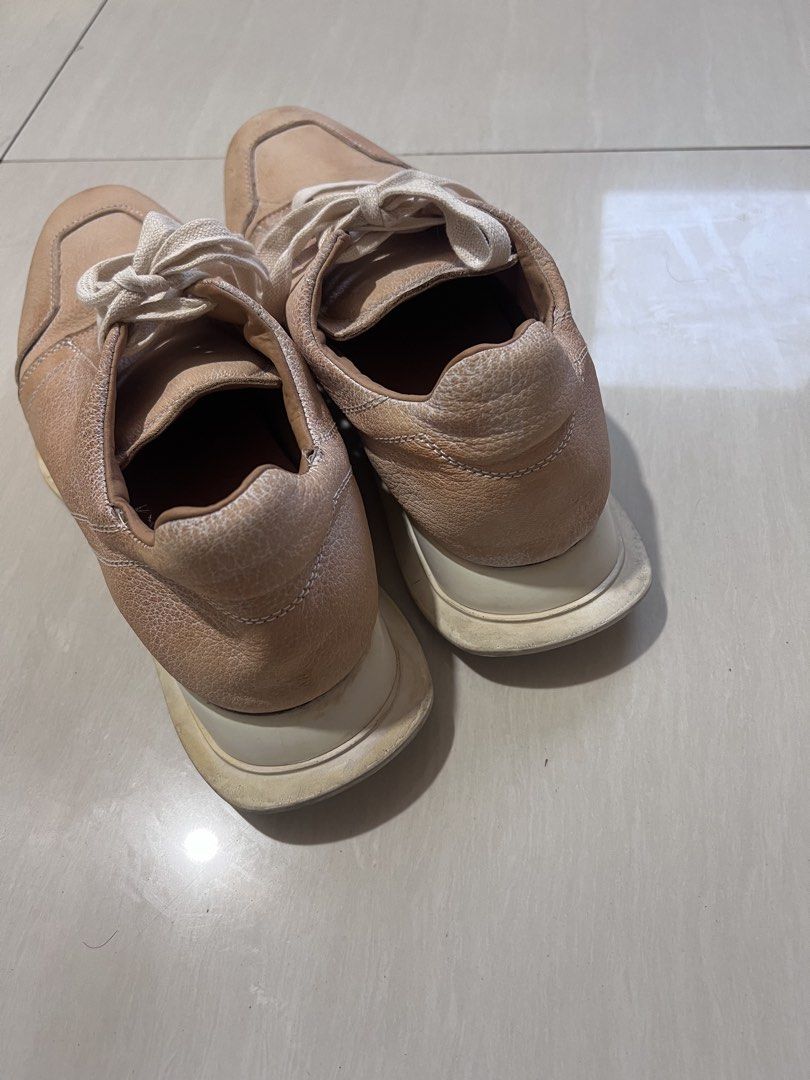 Rick Owens beige leather sneakers (Category: Sneakers) located in Zamboanga. Submitted by safe.haimer (Listing ID 1469038850, Image 3). Description: - Color & Material: Beige textured leather upper with cream laces -size 44 - Soles: Chunky white ridged rubber soles with light dirt marks and minimal tread wear - Condition: Good pre-loved condition featuring gentle creasing and minor scuffs near the toe box - Style: Solid, versatile pair perfect fo