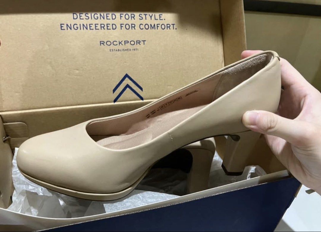 Rockport Nude Pumps Heels with Box (Category: Heels) located in Caloocan City. Submitted by moonstone79344 (Listing ID 1469073731, Image 3). Description: - Brand: Rockport - Style: Classic nude pump with easy-to-walk-in chunky heel - Comfort: Features cushioned insoles for all-day wear - Versatility: Neutral beige color matches almost any outfit - Inclusions: Comes with original branded shoebox.