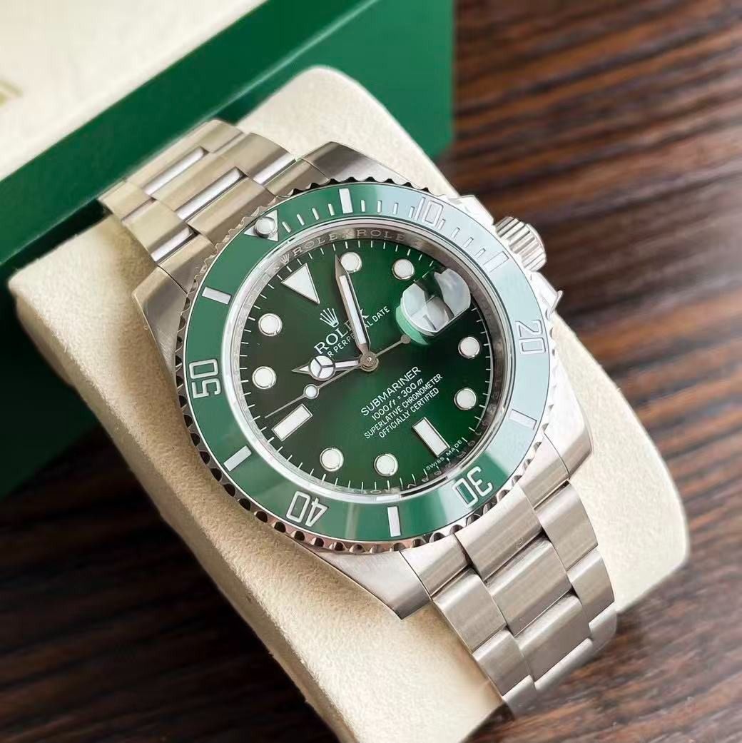 Rolex Submariner Green Dial Watch (Category: Luxury Watches) located in Bayang. Submitted by mysticbird77 (Listing ID 1469012514, Image 2). Description: - Model: Rolex Submariner (Hulk Colorway) - Dial: Striking green sunburst dial with date window and cyclops lens - Bezel: Matching green ceramic insert - Movement: Reliable automatic movement - Bracelet: Durable stainless steel Oyster bracelet - Inclusions: Original green presentation box - Condi