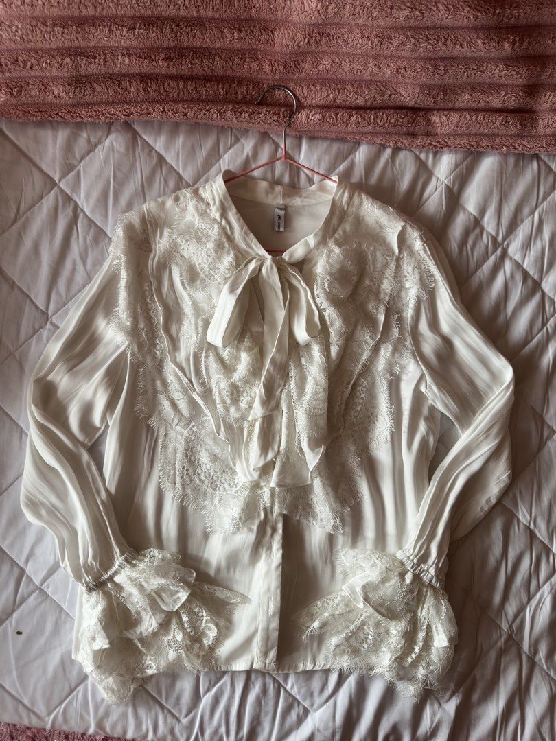 Romantic Lace Tie-Neck Blouse (Category: Longsleeves) located in Cavite. Submitted by yuri_9989 (Listing ID 1469015854, Image 1). Description: ✦ Preloved ✦ Elegant lace panel detailing ✦ Feminine tie-neck design ✦ Flowy long sleeves with lace cuffs ✦ Soft and romantic vintage-inspired look ✦ Perfect for dressy or coquette outfits 📩 DM to claim 💳 Payment first before shipping GoTyme • Gcash • MariBank.