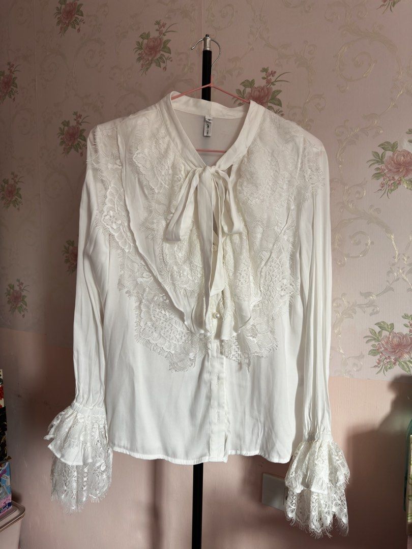 Romantic Lace Tie-Neck Blouse (Category: Longsleeves) located in Cavite. Submitted by yuri_9989 (Listing ID 1469015854, Image 2). Description: ✦ Preloved ✦ Elegant lace panel detailing ✦ Feminine tie-neck design ✦ Flowy long sleeves with lace cuffs ✦ Soft and romantic vintage-inspired look ✦ Perfect for dressy or coquette outfits 📩 DM to claim 💳 Payment first before shipping GoTyme • Gcash • MariBank.