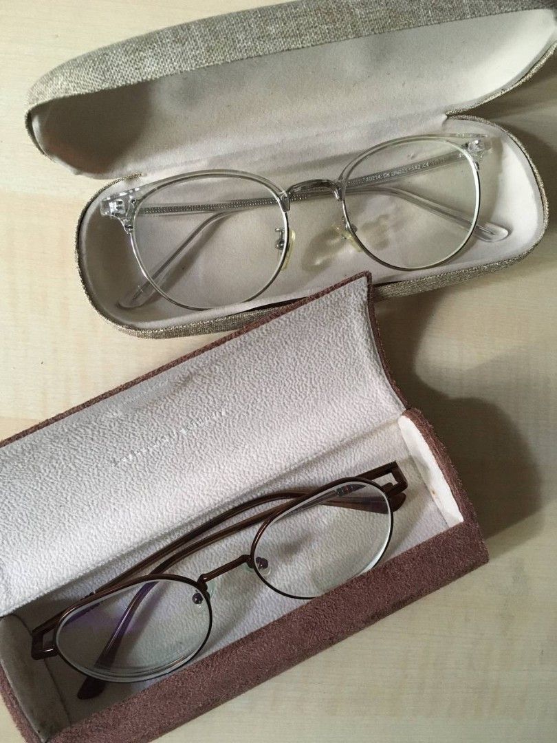 Round Glasses with cases (Category: Sunglasses & Eyewear) located in Manila. Submitted by miax_1222 (Listing ID 1468986695, Image 1). Description: - Two trendy round metal frame glasses - Pair 1: Clear frame with sleek silver arms (Unknown brand) - PHP 300 - Pair 2: Classic brown metal frame (From EO) - PHP 450 - Lightweight and comfortable for all-day wear, perfect for daily wear - interested buyers must shoulder both lalamove booking and sf - I