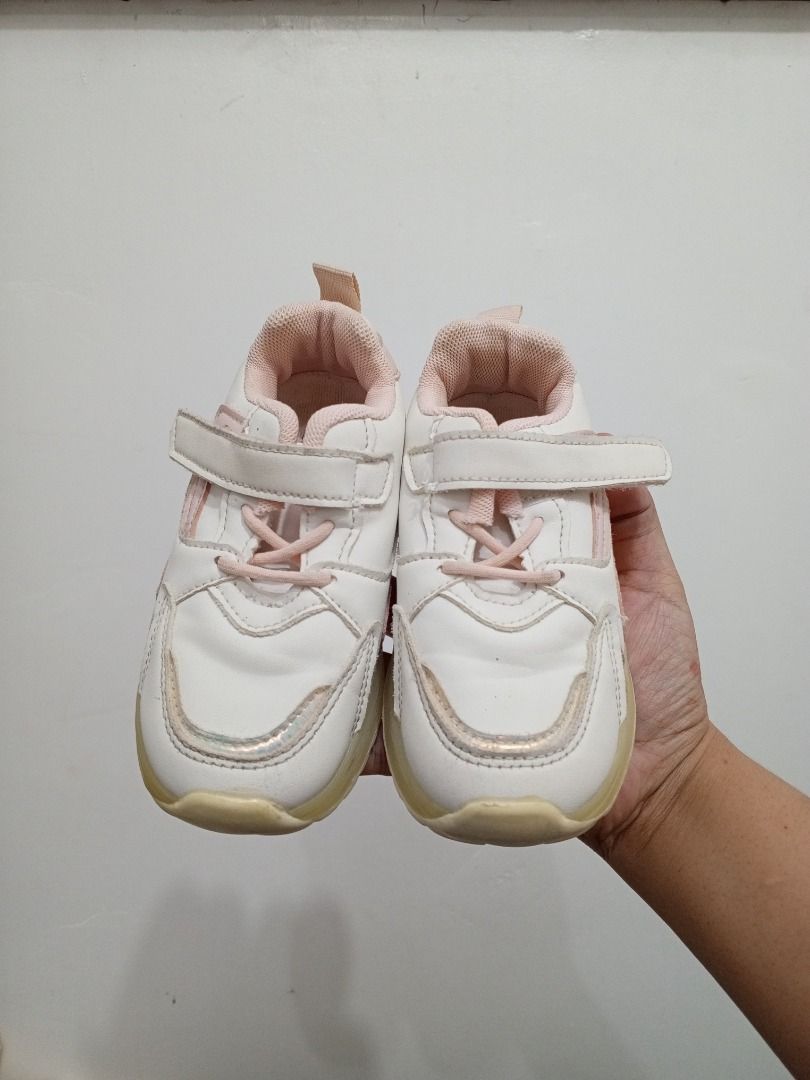Rubber Shoes kids (Category: Babies & Kids Fashion) located in Antipolo. Submitted by krystleandkirstenpreloves (Listing ID 1469057638, Image 1). Description: - Color: Cute pink and white combination - Size: 26 - Materials: Durable synthetic leather and breathable mesh - Closure: Easy velcro strap with elastic laces for quick wear - Features: Heel pull tab and trendy chunky textured sole - Condition: Moderate wear on the bottom tread, still lots 