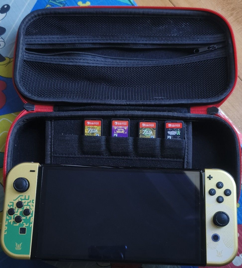 Rush BUNDLE with gamecarts Nintendo Switch Oled (Category: Nintendo) located in Manila. Submitted by leahcim02 (Listing ID 1469011167, Image 1). Description: Sale or swap sa cp pass sa barat pwede oled lang or games lang 1700 each 99%smooth guaranteed no issue all working package: unit orig charger orig dock case and 4pcs gamecarts Zelda BOTW, Zelda TOTK, Pokemon ZA, Pokemon Violet Meet up: Any Malls in NCR/Antipolo.