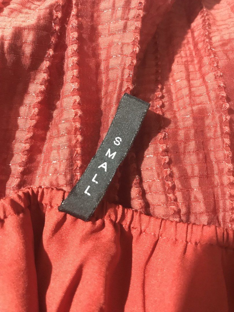 Cute Rust Dress with Tie Ribbon (Category: Dresses) located in Quezon City. Submitted by yourchingu16 (Listing ID 1469142024, Image 3). Description: - Price: 375 if with other items - Autumn Color - Design: Square neckline with front tie ribbon, smocked back for a great fit, midi-length sleeves, and a tiered ruffled skirt - Closure: Convenient side zipper MANNEQUIN Body Frame/Measurement Shoulder - 16” Bustline - 34” Waistline - 27” Hip - 36” .