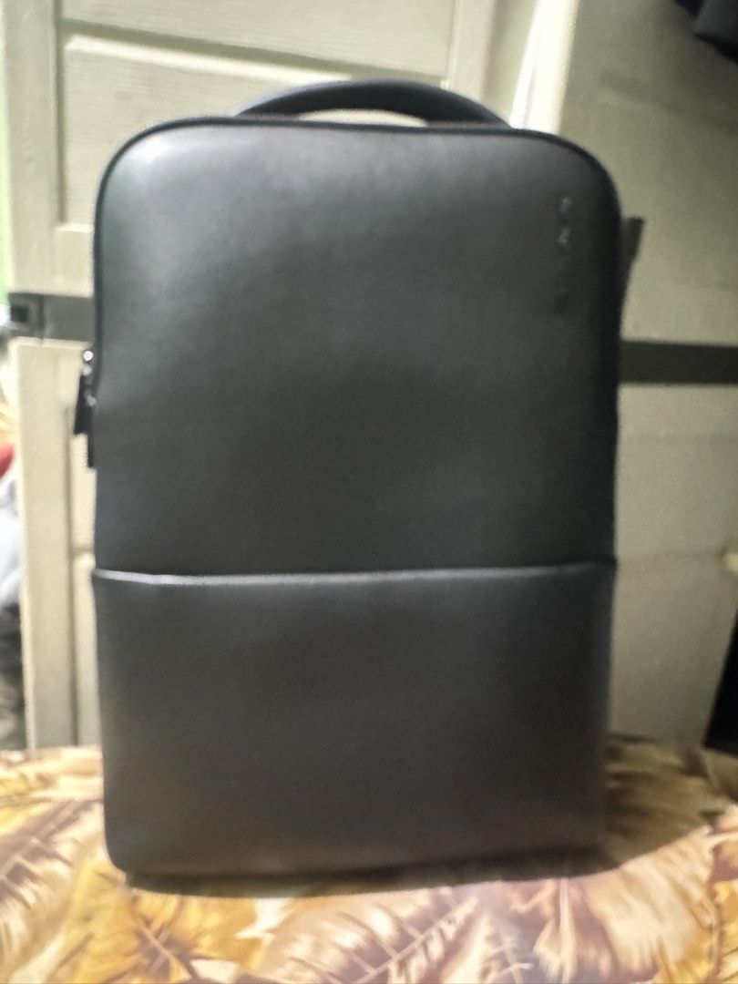 Samsonite Red Neumont 4 Backpack (Category: Backpacks) located in San Juan City. Submitted by poldzhon (Listing ID 1469097646, Image 3). Description: - Brand: Samsonite - Color: Classic Black with stylish leather accents - Material: Durable fabric construction - Storage: Multiple zippered compartments for easy organization - Comfort: Padded mesh shoulder straps and back panel - Features: Sturdy top grab handle and heavy-duty zippers - Condition: 