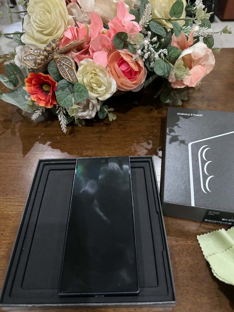 Samsung Fold 7 512GB (Black) (Category: Cases & Sleeves) located in Binan City. Submitted by madelmoiselle (Listing ID 1468989994, Image 3). Description: Selling Samsung Fold 7 512GB (Black) * 1st owner, personal phone (lady oened) * NTC, open line, no lock, no issue Complete box, charger, and receipt * Bought directly at samsung online store * 512gb Storage * 9/10 Condition * No Issue * Has slight scratch (Check photos) * Comes with spigen case 