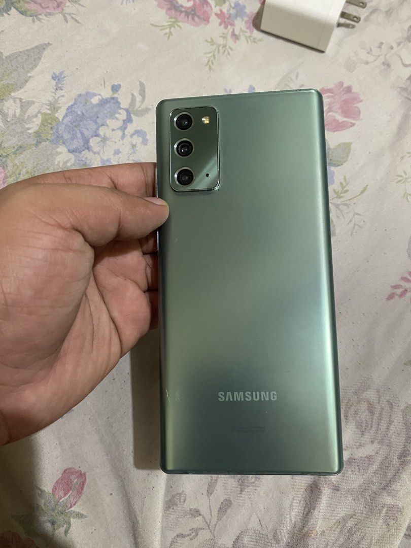 Samsung Note 20 5G Openline (Category: Samsung) located in Pasig City. Submitted by marcrafael (Listing ID 1469134949, Image 2). Description: REPOST AND REPRICE! OPEN FOR SWAP! 📱 SAMSUNG GALAXY NOTE 20 5G — 128GB OPENLINE 🇺🇸 US VERIZON VARIANT 💰 7999PHP FIRM PRICE 🔄 OPEN FOR SWAP + CASH QUICK SPECS: • 8GB RAM + 128GB ROM • Snapdragon 865+ Processor • 6.7” Dynamic AMOLED 2X • 5G | eSIM + Physical SIM • On-display Fingerprint Scanner • Triple 