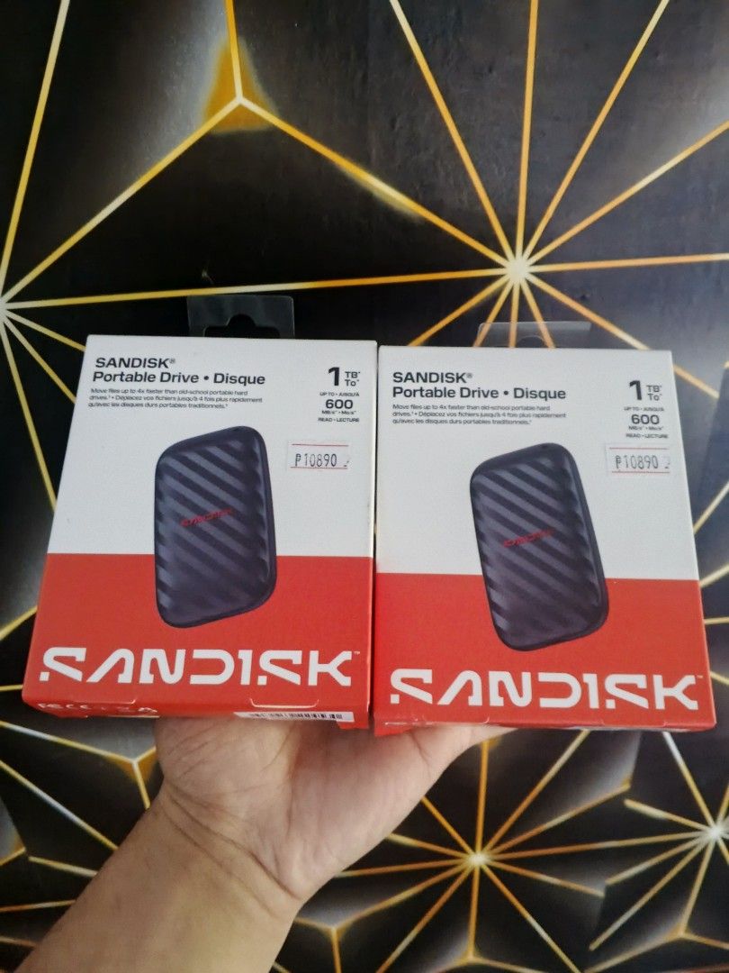 SanDisk Portable Drive 1TB 600MB/s (Category: Hard Disks & Thumbdrives) located in Quezon City. Submitted by jeffersona19407 (Listing ID 1468935976, Image 1). Description: SanDisk Portable SSD 1TB – Up to 600MB/s Looking for fast and reliable portable storage? Check this out! Brand: SanDisk Capacity: 1TB Type: Portable SSD Read Speed: Up to 600MB/s Compact & Portable – madaling dalhin kahit saan Ideal for file storage, documents, photos, videos, 