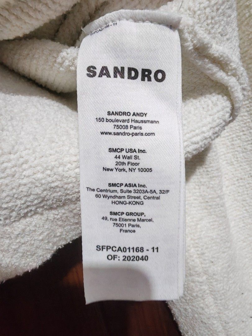 Sandro Denim Trim Cropped Cardigan (Category: Coats, Jackets and Outerwear) located in Quezon City. Submitted by sashasarisarishoppe (Listing ID 1469014395, Image 3). Description: - Brand: Sandro (French Luxury) - Style: Cropped cardigan with sailor collar - Color/Material: Off-white textured knit with blue denim trim - Details: Front button closure with gold-toned hardware, two front pockets with denim flaps - Condition: Excellent , haven't use 