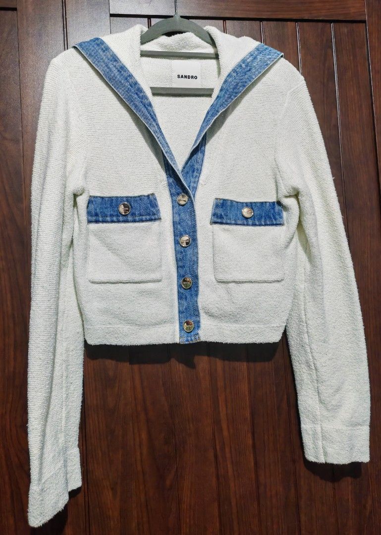 Sandro Denim Trim Cropped Cardigan (Category: Coats, Jackets and Outerwear) located in Quezon City. Submitted by sashasarisarishoppe (Listing ID 1469014395, Image 1). Description: - Brand: Sandro (French Luxury) - Style: Cropped cardigan with sailor collar - Color/Material: Off-white textured knit with blue denim trim - Details: Front button closure with gold-toned hardware, two front pockets with denim flaps - Condition: Excellent , haven't use 