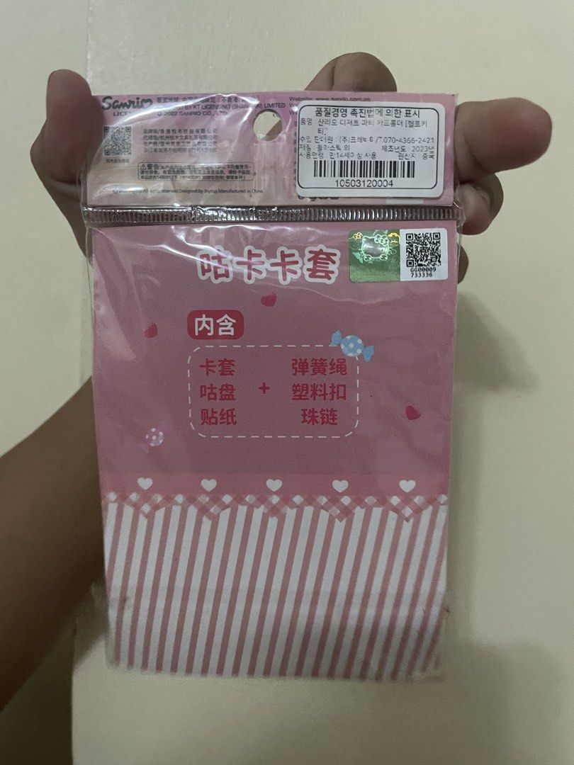 Sanrio Hello Kitty DIY Card Holder Set Pink (Category: Wallets & Card holders) located in Quezon City. Submitted by lianas_preloved (Listing ID 1469040577, Image 2). Description: - Authentic Sanrio x Joytop Kitty DIY card holder set (2023 release) - Color: Cute pink theme - Condition: Brand new, factory sealed - Perfect for ID decoration and photocard collecting - Set includes: Plastic card case, decorative stickers, spring coil rope, plastic cli