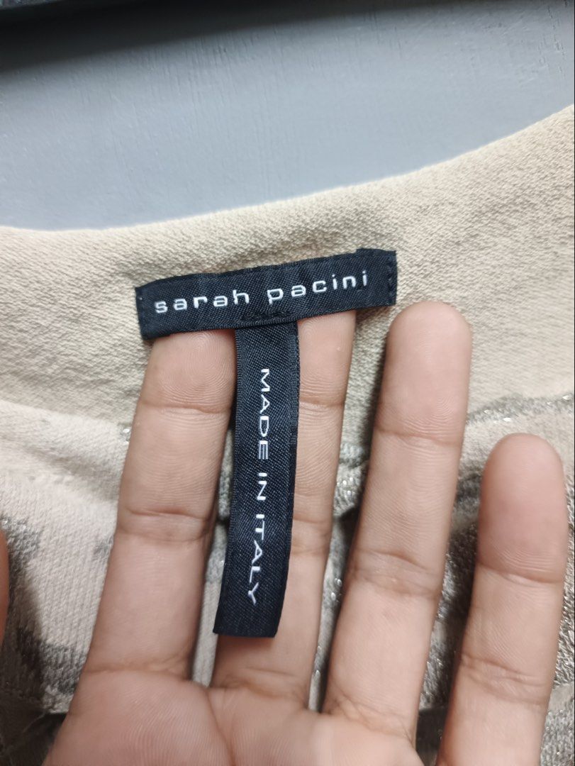 SARAH PACINI (Category: Sleeveless) located in Dasmarinas. Submitted by jessputrages (Listing ID 1469050434, Image 3). Description: For sale Sarah Pacini Excellent condition No issue 1000 plus shipping fee Pm for more details.