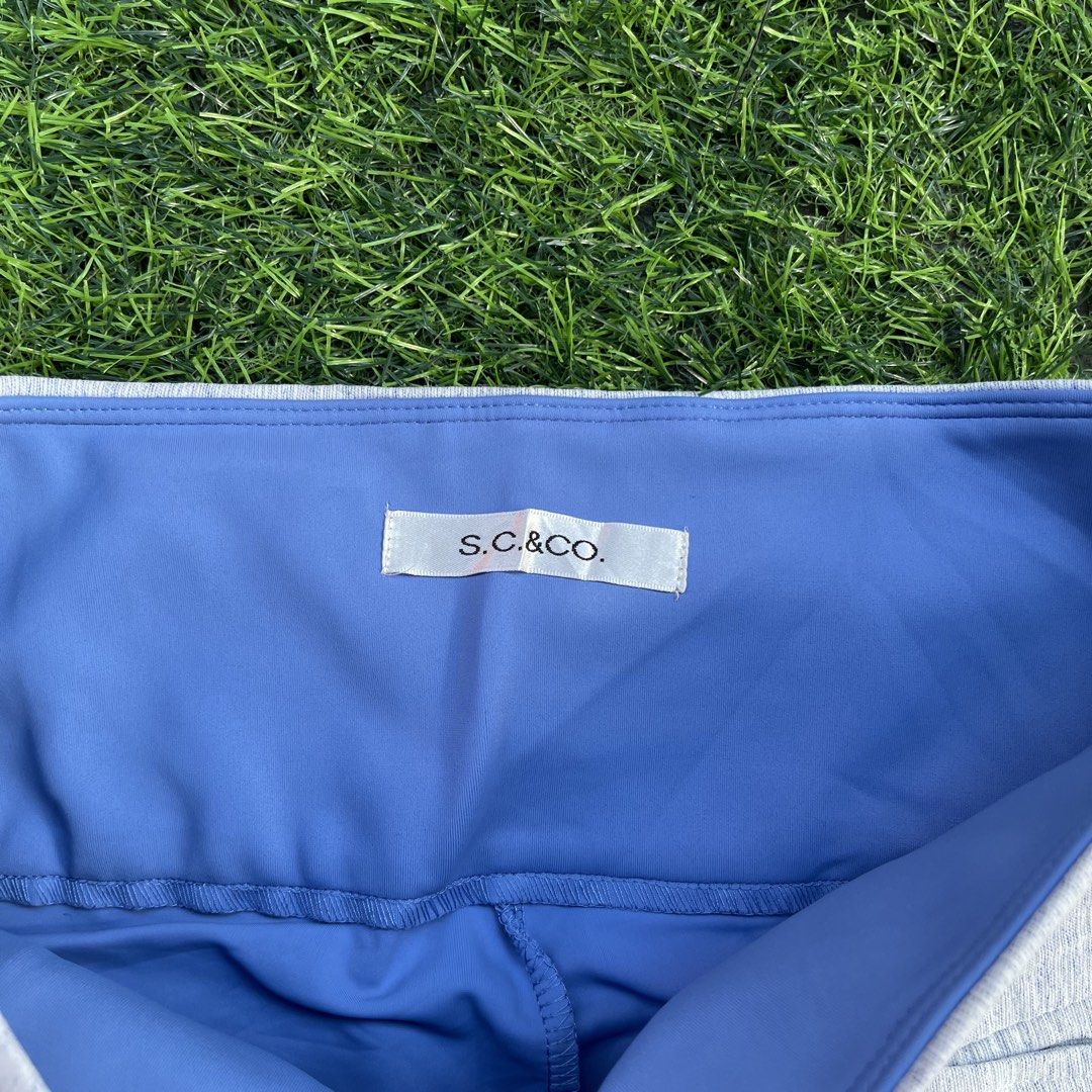 S.C. & Co. Grey Athletic Skort with Blue Shorts (Category: Activewear) located in Cuyapo. Submitted by Ashtyn.Pre.Loved (Listing ID 1469071347, Image 2). Description: - Brand: S.C. & Co. - Color: Grey heathered with blue built-in compression shorts - Fit: High waistband for extra support and coverage - Material: Smooth, stretchy, and active-friendly - Ideal For: Tennis, golf, workouts, and running errands - Condition: Clean lining, brand tag inta