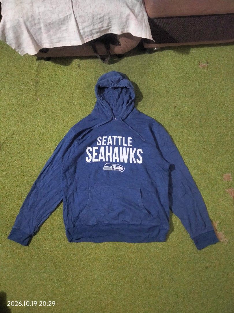 Seattle Seahawks Hoodie (Category: Coats, Jackets and Outerwear) located in Caloocan City. Submitted by haruconcep52476 (Listing ID 1469078379, Image 1). Description: Dimensions W23×L27.5 Good condition Color rate 10 No issue Fresh from bale.