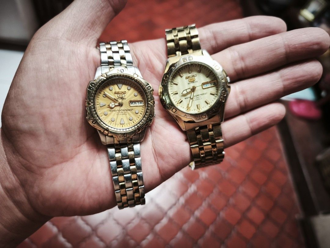 Seiko 5 Sports Automatic (4 pcs) (Category: Men's Watches) located in Manila. Submitted by raffy.dlc (Listing ID 1468965079, Image 3). Description: Seiko 5 Sports (4pcs) 7S36 automatic movement Made in Japan, 23 Jewels 100 Meters water resistant All original Head and Bracelet Gold wave Dial, two tone silver and gold, 40mm PHP 3,200 Yellow Gold wave Dial, gold bracelet, 40mm PHP 2,200 Textured Black dial, "Mini Stargate" With AM rubber strap, rota
