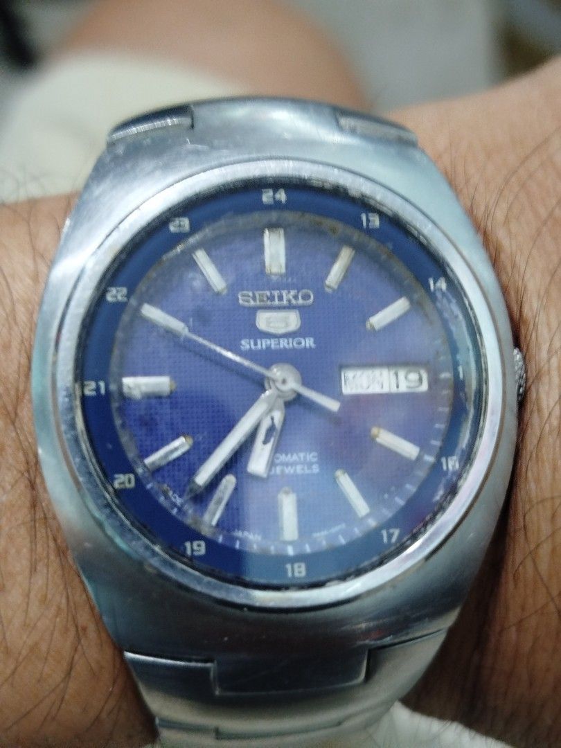 Seiko 5 Superior Automatic Watch Blue Dial (Category: Men's Watches) located in Subic. Submitted by regiedaniel01 (Listing ID 1469039826, Image 2). Description: - Model: Seiko 5 Superior Automatic Watch - Dial: Blue textured dial with 24-hour outer track and day-date window at 3 o'clock - Build: Stainless steel case and bracelet with scratch-resistant sapphire crystal top - Movement: Automatic movement with 23 jewels and exhibition case back - Wa