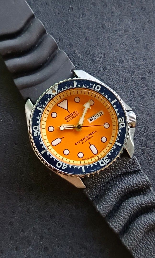 SEIKO ORANGE DIVER SKX011J (Category: Luxury Watches) located in Manila. Submitted by arcads97 (Listing ID 1469108325, Image 1). Description: Vintage Seiko Divers " SKX011J -7s26-0020 -automatic -Made In Japan -Orange Dial -Large Size -Day/Date Display (quickset working) -All original Head -recently Serviced/All working -Period correct Condition, no aftermarket parts fitted. -Personal collection/used only, not water pressure or diving tested. -Fo