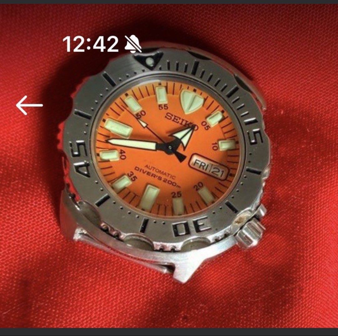 Seiko Orange Monster Automatic Diver's 200m Watch Head (Category: Men's Watches) located in Muntinlupa City. Submitted by sassygchanel (Listing ID 1469050391, Image 1). Description: - Model: Seiko Automatic Diver's 200m - Dial: Vibrant orange with luminous hands and markers - Case & Bezel: Durable stainless steel - Features: Day-date window at 3 o'clock, screw-down crown at 4 o'clock - Condition: Running movement, watch head only (strap excluded)
