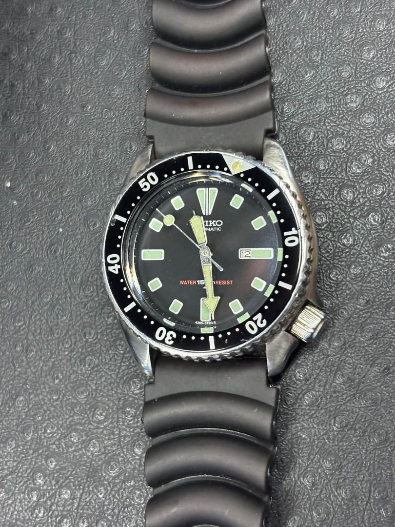 Seiko Vintage Automatic Diver (4205-0150) Water Resistant (Category: Men's Watches) located in Caloocan City. Submitted by primetime_watches (Listing ID 1468965735, Image 2). Description: * Brand: Seiko * Model/Reference: 4205-0150 * Movement: Automatic * Dial: Black * Case: Stainless steel * Water Resistance: ✅ * Features: Rotating bezel and date display *WORKING! * After market : Strap, Ring, Dial (the rest all original) 💸Price: 3,300 📦Shipme