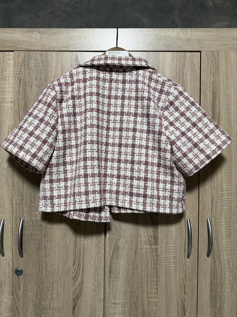 Semi cropped blazer (Category: Coats, Jackets and Outerwear) located in Bulacan. Submitted by relove.re (Listing ID 1469044246, Image 2). Description: Chic Tweed Cropped Blazer ✨ Classy burgundy/Pinkish and cream plaid tweed blazer with short sleeves, a stylish lapel collar, and elegant button details. Perfect for a Korean-inspired, feminine, and sophisticated look! 💕 Size: S - M ✔️ Chic cropped style ✔️ Short sleeves ✔️ Elegant plaid pattern ✔️