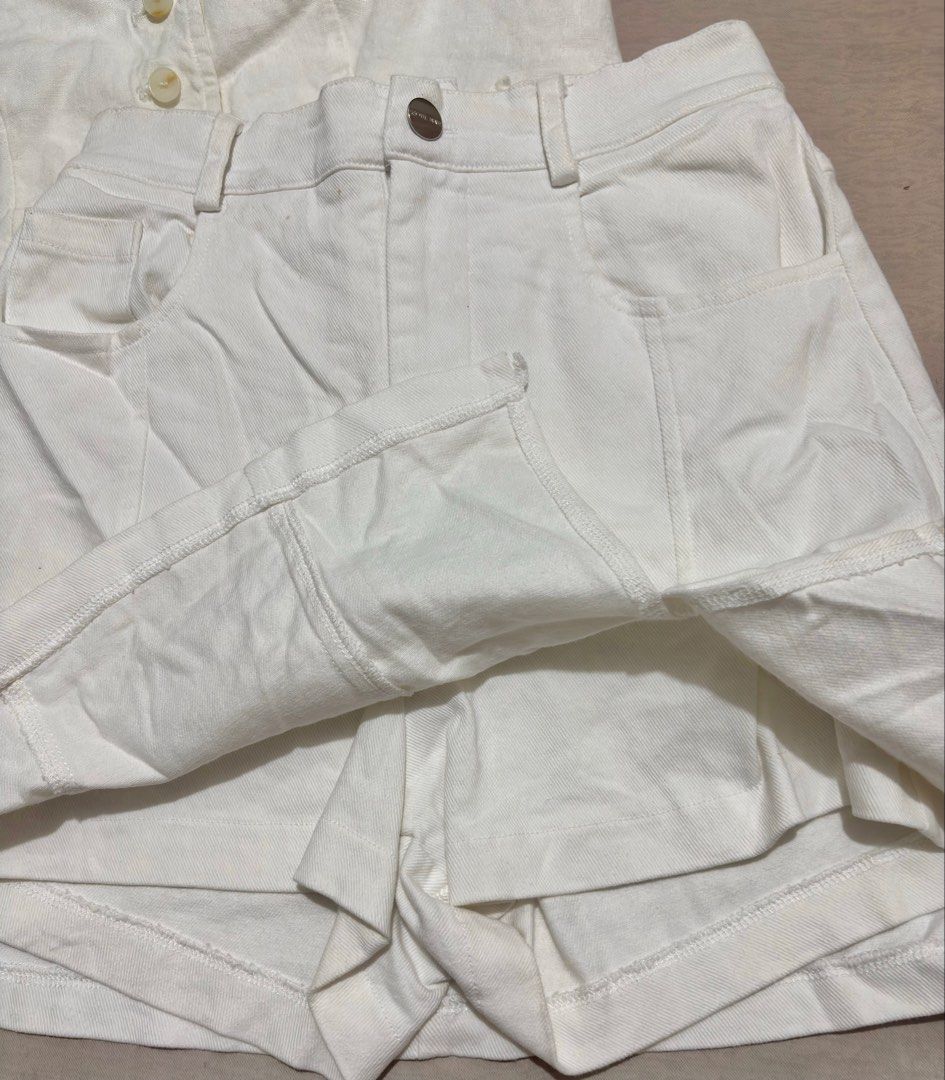 Seoul Mate White Skort (Category: Skirts) located in Caloocan City. Submitted by nnnprelovedclothes (Listing ID 1468982870, Image 2). Description: - Brand: Seoul Mate - Color: Clean white (denim-like fabric) - Perfect for: Everyday wear, casual , or brunch dates.