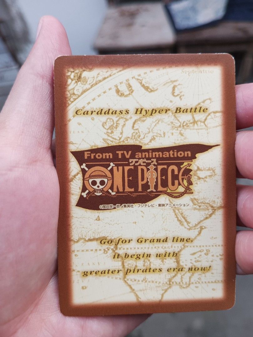 Shanks C122 L (Category: Raw Singles) located in Manila. Submitted by glique30 (Listing ID 1469003605, Image 2). Description: This is a 2000 Bandai One Piece Hyper Battle Carddass card featuring Shanks and Luffy (card number C122, titled "Tomoe no Daishō" or "Price for a Friend" / "Luffy, But Shanks Your Arm!"). May konting yupi sa bandang taas sa Kanang. P1,700 .