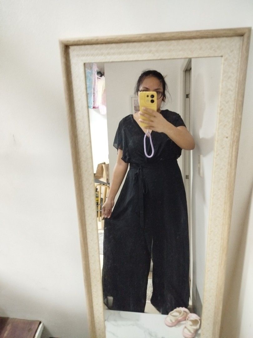 Shein Black Jumpsuit Size XL (Category: Jumpsuits) located in Taguig. Submitted by dreazac (Listing ID 1469082334, Image 2). Description: - Brand: Shein - Color: Classic Black - Size: Fits up to XL - Measurements: Bust 40" | Waist 37" | Length 59" - Features: V-neck, flutter sleeves, wide-leg cut, and includes a waist tie belt - Perfect for: Office wear, formal events, or smart-casual outings - Mode of Payment: GCash, BPI, or Bank Transfer - Ship