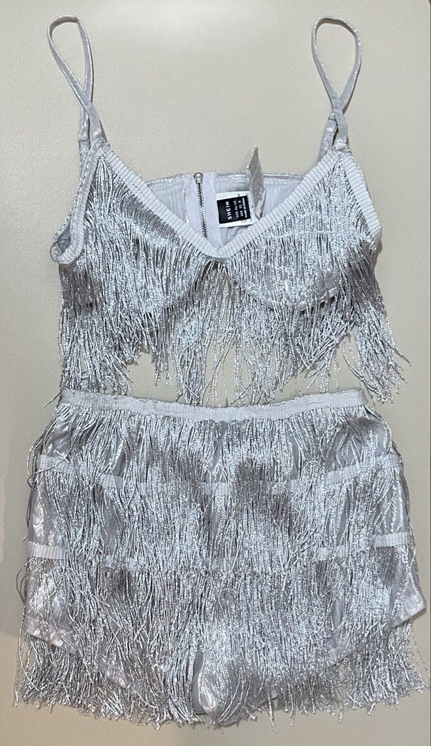 SHEIN Cami Silver Fringe Two-Piece Set (Category: Sets or Coordinates) located in Caloocan City. Submitted by anjouir (Listing ID 1469052210, Image 1). Description: — ₱ 800 — Details: Crop top with spaghetti straps and back zipper; matching high-waisted shorts with all-over tiered fringe - Condition: Worn once only to fit and stored safely since then — Mop: Gcash — Loc: South Caloocan City .