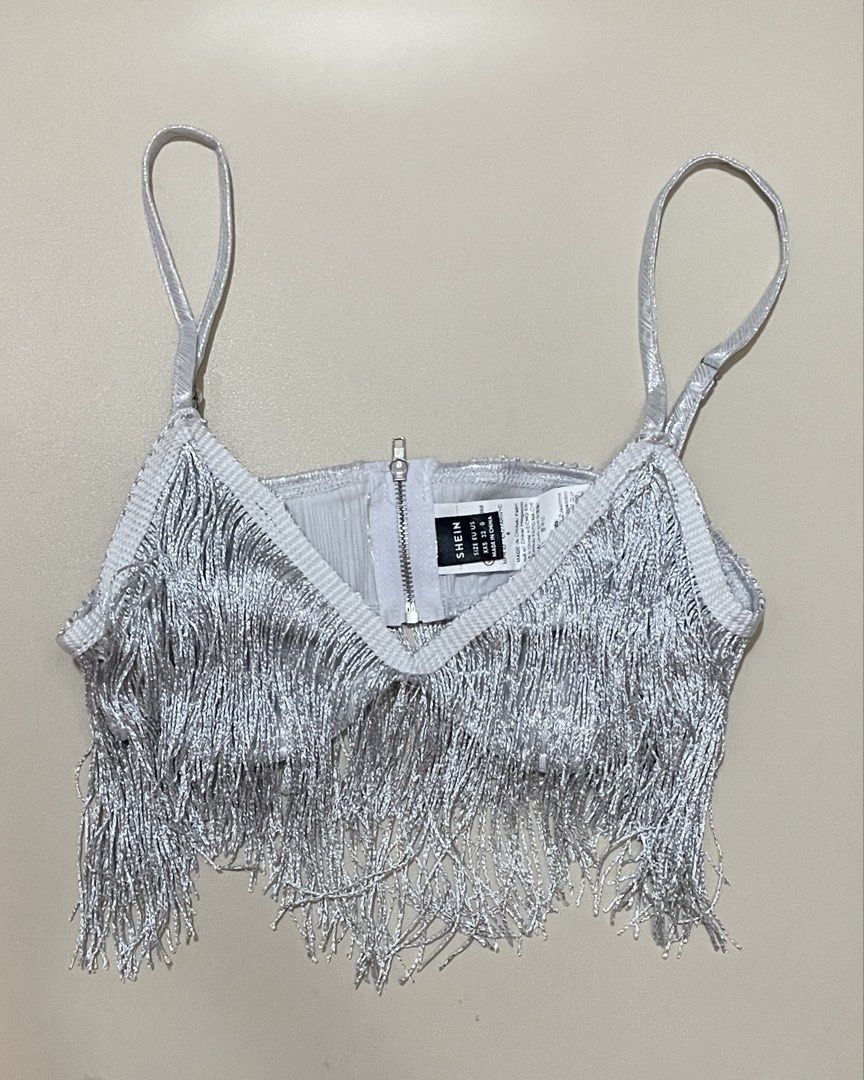 SHEIN Cami Silver Fringe Two-Piece Set (Category: Sets or Coordinates) located in Caloocan City. Submitted by anjouir (Listing ID 1469052210, Image 2). Description: — ₱ 800 — Details: Crop top with spaghetti straps and back zipper; matching high-waisted shorts with all-over tiered fringe - Condition: Worn once only to fit and stored safely since then — Mop: Gcash — Loc: South Caloocan City .