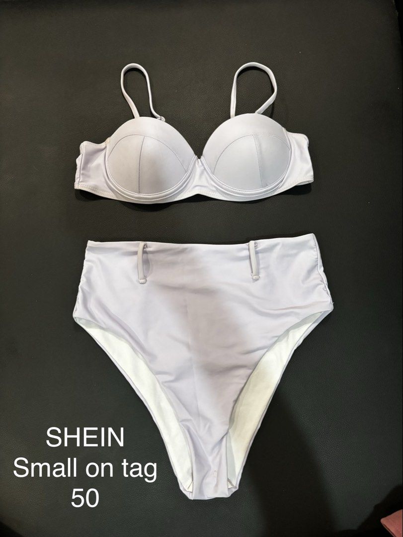 SHEIN Light Purple High-Waisted Bikini Set Small (Category: Bikinis & Swimsuits) located in Valenzuela. Submitted by cleighr (Listing ID 1469100846, Image 1). Description: - Brand: SHEIN - Style: Two-piece bikini - Color: Light purple - Size: Small - Top: Underwire, padded, adjustable straps - Bottoms: High-waisted, fully lined, decorative vertical loop details on the front - Condition: Clean fabric, no flaws noticed.