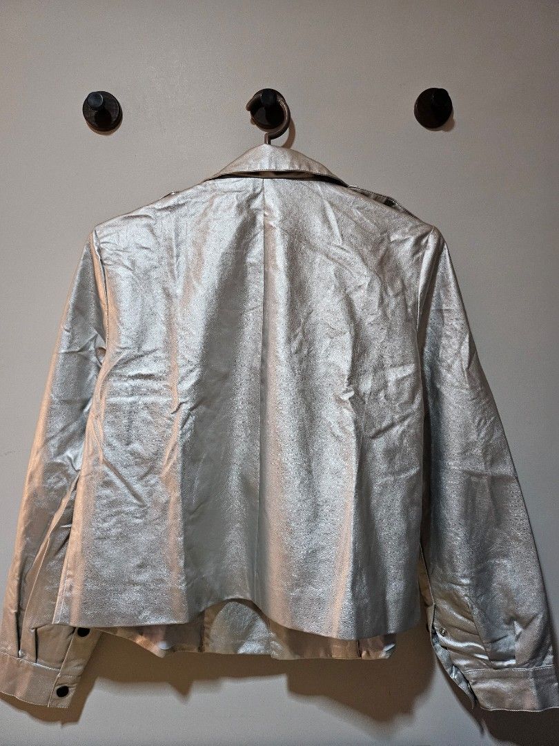 Shein Oversized Faux Leather Jacket (Silver) (Category: Coats, Jackets and Outerwear) located in Quezon City. Submitted by nndvy (Listing ID 1469023573, Image 3). Description: - Brand: Shein - Size: M (oversized) - Bust Width: 48cm - Length: 58cm - Condition: Used only once. Wrinkles from storage could still be ironed off - RFS: Decluttering - MOP: Gcash, BPI, Unionbank, BDO - Delivery: GrabExpress, Lalamove, LBC (shouldered by buyer).