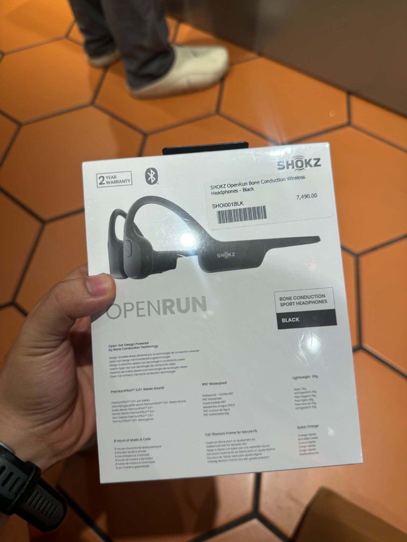 Shokz OpenRun Bone Conduction Wireless Headphones Black (Category: Headphones & Headsets) located in Muntinlupa City. Submitted by handpickedbyjc (Listing ID 1468930847, Image 2). Description: - Brand new in box (BNIB) and still sealed in plastic - Color: Sleek Black - Open-ear design for situational awareness while working out - IP67 waterproof rating (sweat and rain-resistant) - 8 hours of continuous music and calls - Quick charge feature - Ult