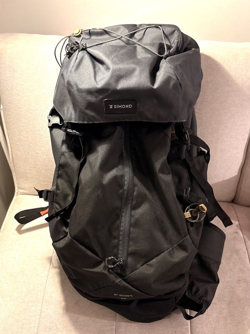 Simond MT 100 Easy-fit 50L Hiking Backpack (Category: Backpacks) located in Pasig City. Submitted by shitaku.ph (Listing ID 1469111269, Image 1). Description: - Brand/Model: Simond MT 100 Easy-fit Hiking Backpack - Color: Dark Grey - Capacity: 50 Litres (ideal for multi-day treks) - Comfort: Adjustable shoulder straps and supportive hip belt with a zipped pocket - Accessibility: Front vertical zip for easy main compartment access - Storage: Top l
