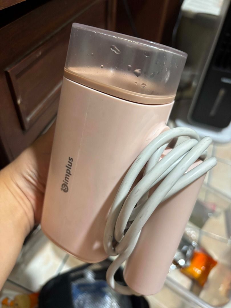 Simplus Portable Garment Steamer Pink (Category: Irons & Steamers) located in Manila. Submitted by cyrineravina (Listing ID 1468977561, Image 1). Description: - Brand: Simplus mini garment steamer - Color: Pastel pink - Condition: Fully functional - Features: Compact size with clear water tank, great for travel and quick touch-ups.