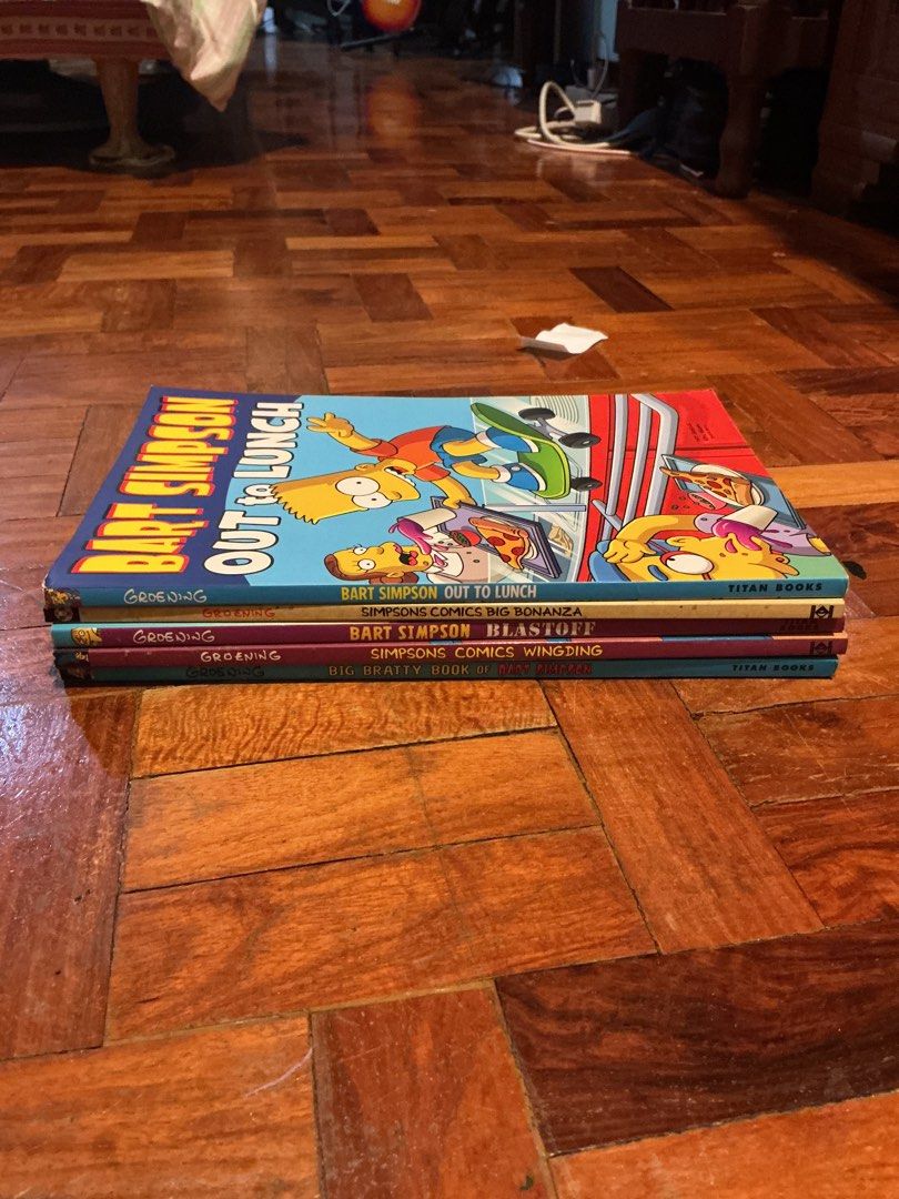 Simpsons Comics (READ DESC) (Category: Comics & Manga) located in Muntinlupa City. Submitted by antonrizz (Listing ID 1469043514, Image 1). Description: 250 for 1 1200 for all - Set of 5 classic Simpsons comic books published by Titan Books - Includes: Bart Simpson Out to Lunch, Simpsons Comics Big Bonanza, Bart Simpson Blastoff, Simpsons Comics Wingding, and Big Bratty Book of Bart Simpson - Created by Matt Groening - Great addition for fans and