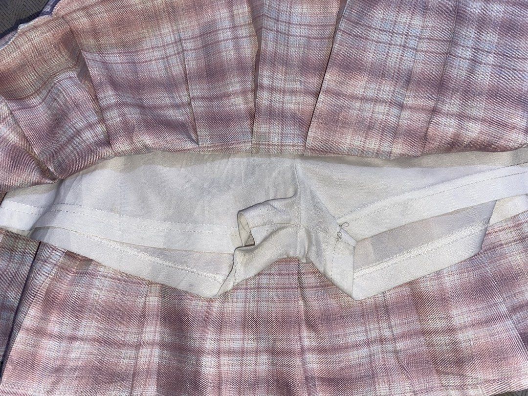 Skirt Color Pink (Category: Skirts) located in Manila. Submitted by dnlprtll (Listing ID 1469097296, Image 3). Description: > Pink Plaid Pleated Tennis Mini Skirt - Y2K / Kawaii > > - No brand / Generic (China) > - Color: Pastel pink, white plaid > - Material: 100% Polyester - lightweight, breathable, holds pleats well > - Size on tag: 140/60 - fits XS to Small, high-waisted > - Style: A-line pleated, mini length, elastic garter at back for stret