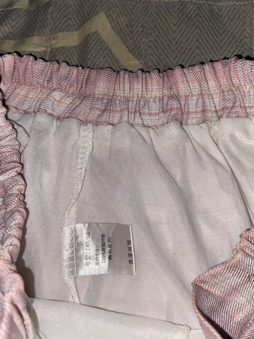 Skirt Color Pink (Category: Skirts) located in Manila. Submitted by dnlprtll (Listing ID 1469097296, Image 2). Description: > Pink Plaid Pleated Tennis Mini Skirt - Y2K / Kawaii > > - No brand / Generic (China) > - Color: Pastel pink, white plaid > - Material: 100% Polyester - lightweight, breathable, holds pleats well > - Size on tag: 140/60 - fits XS to Small, high-waisted > - Style: A-line pleated, mini length, elastic garter at back for stret