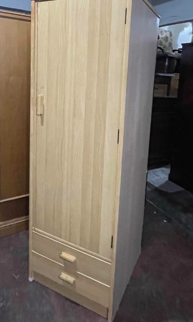 Slim Wardrobe Closet Cabinet with Bottom Drawers (Category: Shelves, Cabinets & Racks) located in Quezon City. Submitted by dannikkishoppe2 (Listing ID 1469156575, Image 3). Description: Slim Wardrobe Closet Cabinet with Bottom Drawers‼️₱6500‼️ ✔️ Sturdy Wooden Construction ✔️ Space-Saving Design ✔️ Perfect for Organizing Your Clothes and Essentials Please manage your expectations as there might be minimal flaws. Color may vary due to lighting, i