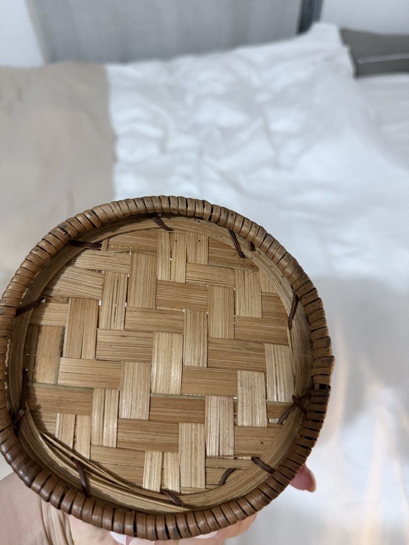 Small Round Woven Rattan Basket Storage (Category: Storage Boxes & Baskets) located in Taguig. Submitted by mengxir20193848 (Listing ID 1469095473, Image 3). Description: - Material: Natural rattan and bamboo strips with a sturdy brown rim - Design: Small round shape with woven wicker sides and a flat woven base - Versatile Use: Handy container for organizing knick-knacks on desks, tabletops, or vanities - Aesthetic: Natural brown tones that effo