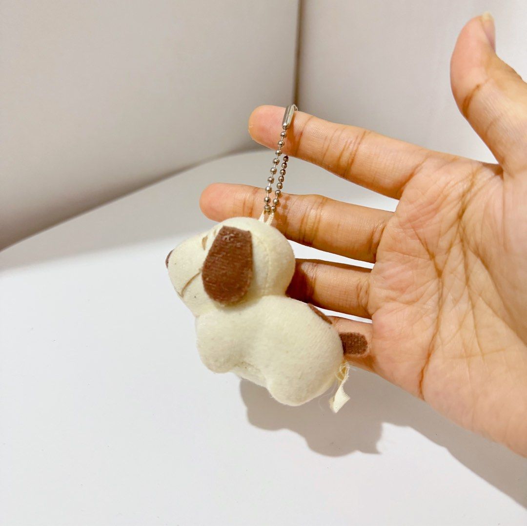 Snoopy Peanuts Brown Charm Plush (Category: Plushies & Soft Toys) located in Manila. Submitted by ashyyel_ (Listing ID 1469141950, Image 2). Description: .