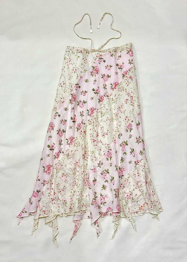 SOLD ❌ Pink Floral Patchwork Skirt Beaded (Category: Skirts) located in Cavite. Submitted by chikzie (Listing ID 1469078414, Image 1). Description: - Brand: Limited Too - Size: Youth 10 - Material: 100% cotton (Made in Cambodia) - Design: Pink & cream patchwork with all-over floral prints, sparkly sequins, and bead accents - Fit & Style: Adjustable halter-style tie waist straps and trendy asymmetrical handkerchief hem with raw edges.