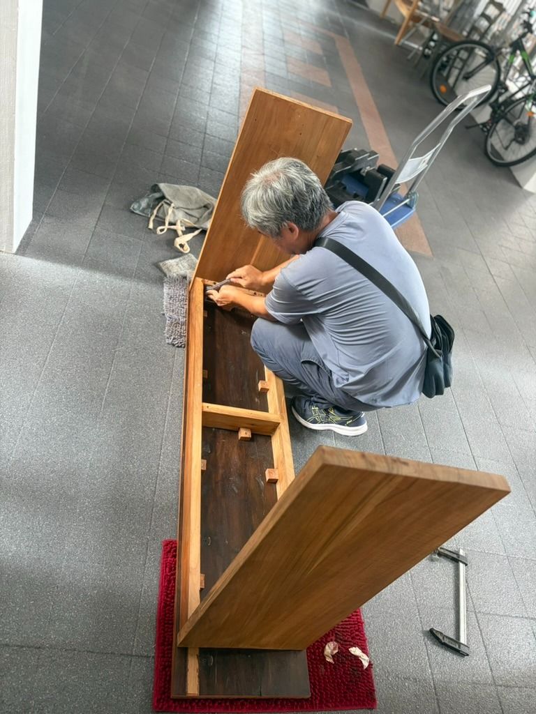 Solid Wood Console Table Entryway Table (Category: Tables & Sets) located in Singapore. Submitted by fluffybailey (Listing ID 1469002765, Image 3). Description: - Material: Solid wood with a warm brown finish - 150/33/82cm - Kindly arrange you own delivery - Custom piece made for our hallway - Design: Clean lines, minimalist, and versatile - Fit: Ideal for narrow hallways and entryways - Build: Sturdy construction featuring thick plank legs - Sty